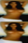 Black naked woman having